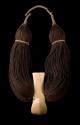Lei niho palaoa, necklace of human hair and walrus tusk (meant to imitate whale tooth)