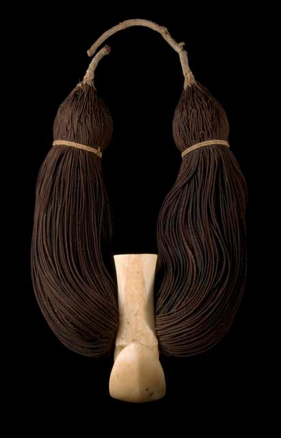 Lei niho palaoa, necklace of human hair and walrus tusk (meant to imitate whale tooth)