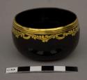 Small black lacquer bowl with gold design