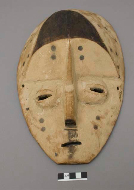 Mask, white, with pyrography