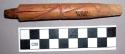 Short wooden pipe stem with incised design