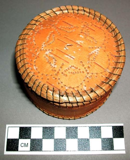 Small cylindrical bark box prepared for quill work.
