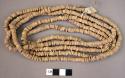 Beads, strings of ostrich shell beads