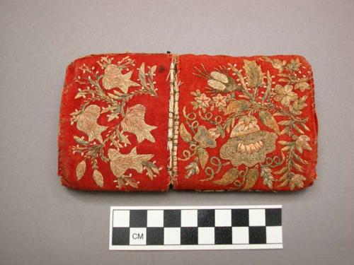 Birch bark case covered in red flannel