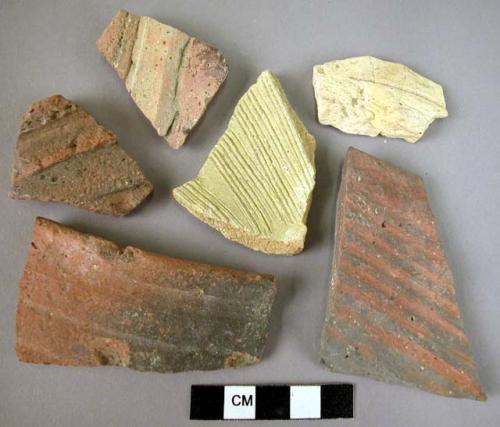 7 potsherds with grooving