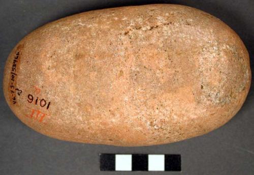 Smoothing or grinding stone. ovoid (oblong). 1 flat worn & pecked face (with str