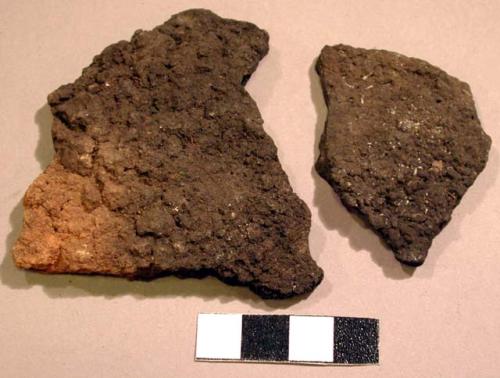 Ceramic rim sherds, burnt, red ware, incised design