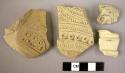 4 potsherds - gray ware, incised