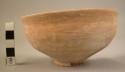 Pottery bowl fragment, base complete & more than 1/2 sides - plain ware, tan bur