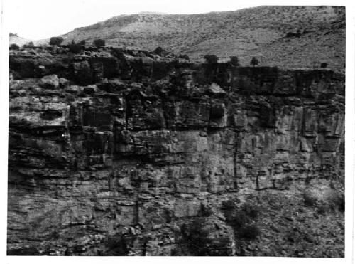 Photo of Ledge Formation - Lower Range Creek Granary in Left Center of Picture