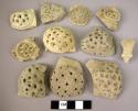 11 potsherds - moulded ware (local)