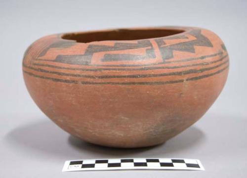 Black on red pottery seed bowl