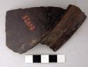 Ceramic sherd, rim, polished black ware, incised, repaired