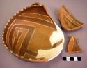 Polychrome pottery bowl with horizontal strap handle--restorable