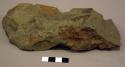 Notched stone axe