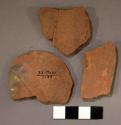 4 black-on-red potsherds, 2 of them used
