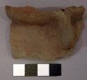 Sherd of double pottery jar showing lug