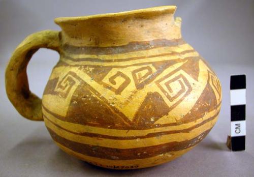 San Bernardo black on yellow pottery small handled jar