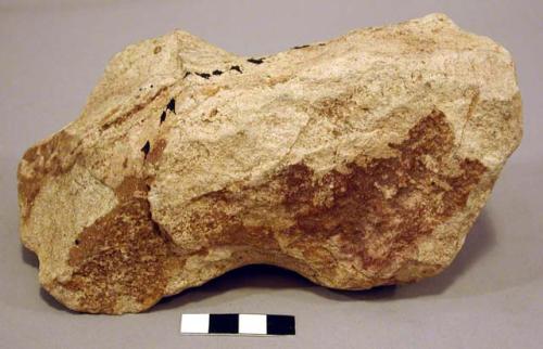 Notched stone axe