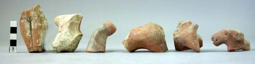 Ceramic figurine fragments, human and animal effigies, red ware, some painted