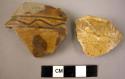 2 potsherds - yellow-brown glaze (local)