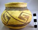 Fine geometric black-on-yellow pottery mug