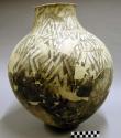 Large restored black-on-white tusayan type pottery jar
