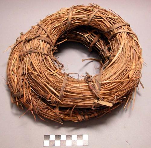 Two bundles of basket material tied with yucca