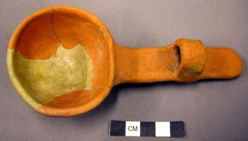 Plain orange ladle--restored