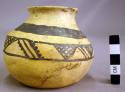 Jeddito black-on-yellow pottery jar--small