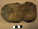 Notched stone axe