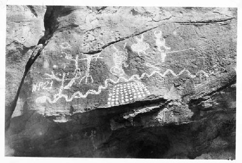 Petroglyph, animal and human figures