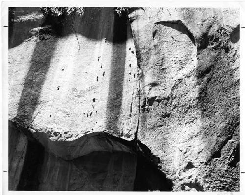 Petroglyph panel on road to Echo Park noted by the Park Service sign