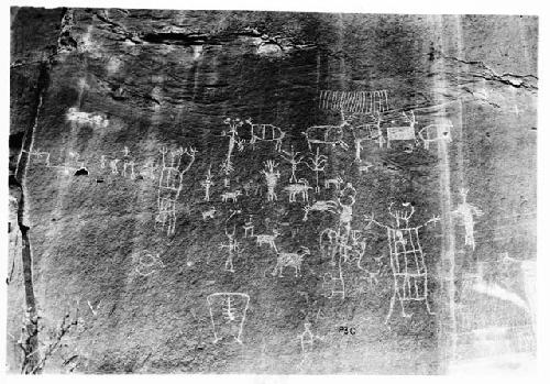 Petroglyph, human and animal figures