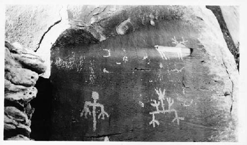 Petroglyph with deer and human figures