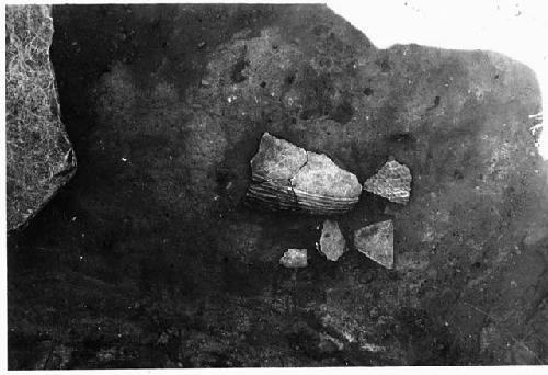 Kiva 1; pot-sherds on floor east of ventilator opening