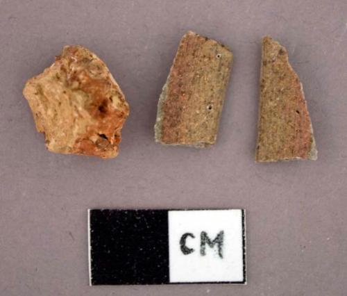 Gray bodied earthenware rim or footring sherds, possibly salt glazed stoneware, two sherds crossmend; non-cultural stone fragment