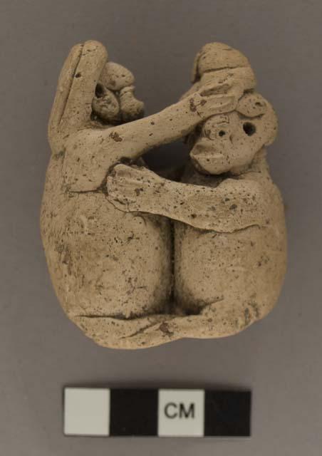 Fornicating couple-rattle-unpainted