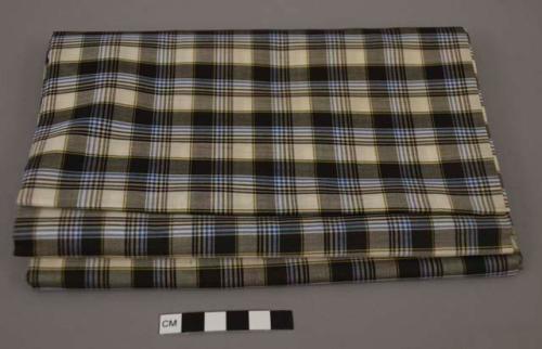 Fabric for man's longyi; white, black and blue plaid