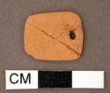 Stone, ground pendant, rectangular with perforation at top, red, broken & mended