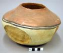 Jar, polacca polychrome style c. curvilinear design. 14.2 x 21.7 cm.