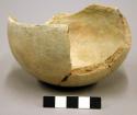 Hemispherical bowl; slightly incurved; body repair, broken rim, rounded base - s