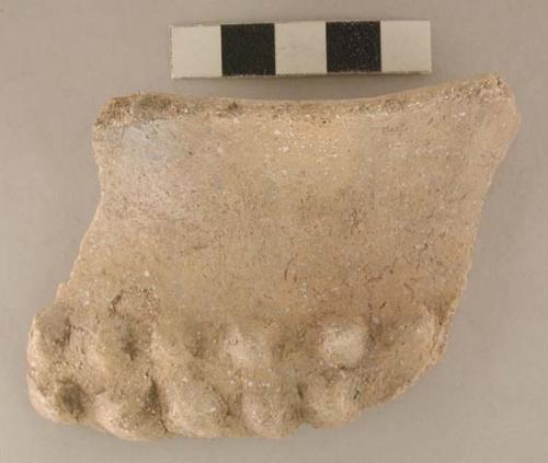 Unclassified shell tempered and incised potsherd