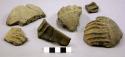 Ceramic rim and body sherds, applied striated design on some sherds