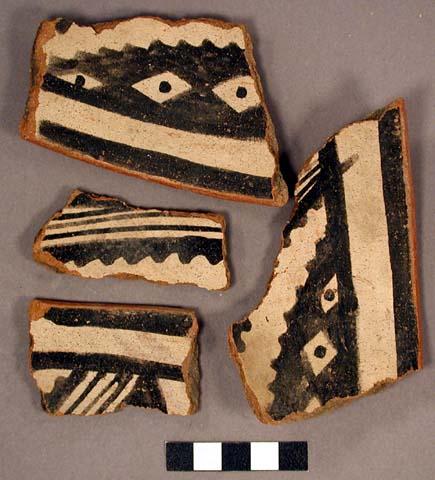 Ceramic rim and body sherds, exterior fire clouded red, interior black on white