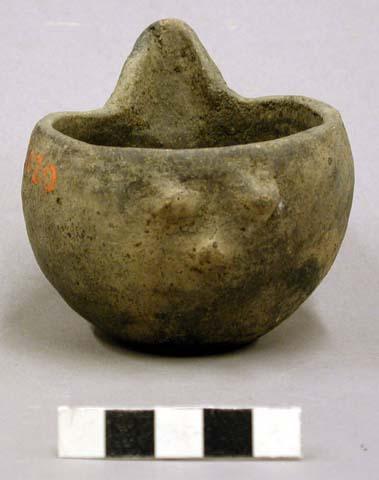 Ceramic vessel, 1 spout, 3 lugs opposite spout.