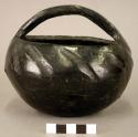 Basket-shaped pottery vessel (black)