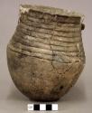Ceramic jar, banded neck, two lug handles, flared rim, mended