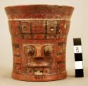 Cup (Kero) ornamented, human face