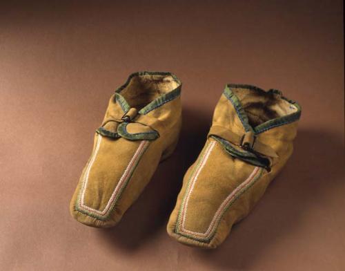 Pair of moccasins with buckles